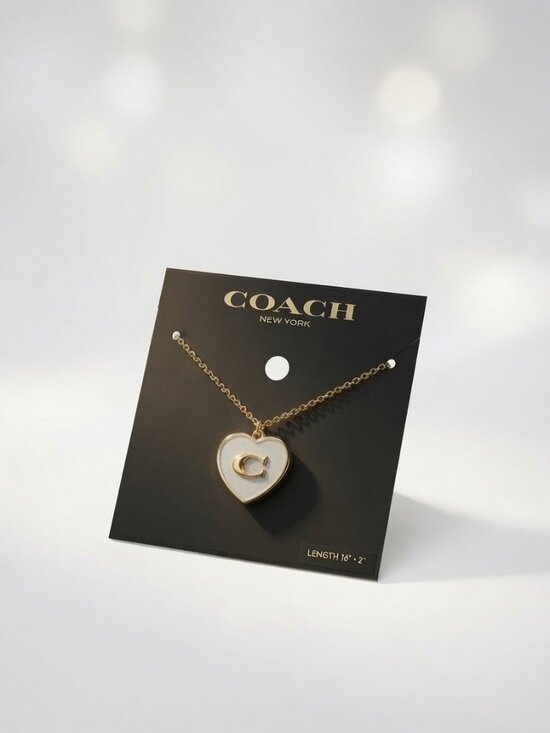 Coach Jewelry - NWT Coach White Heart Locket Necklace